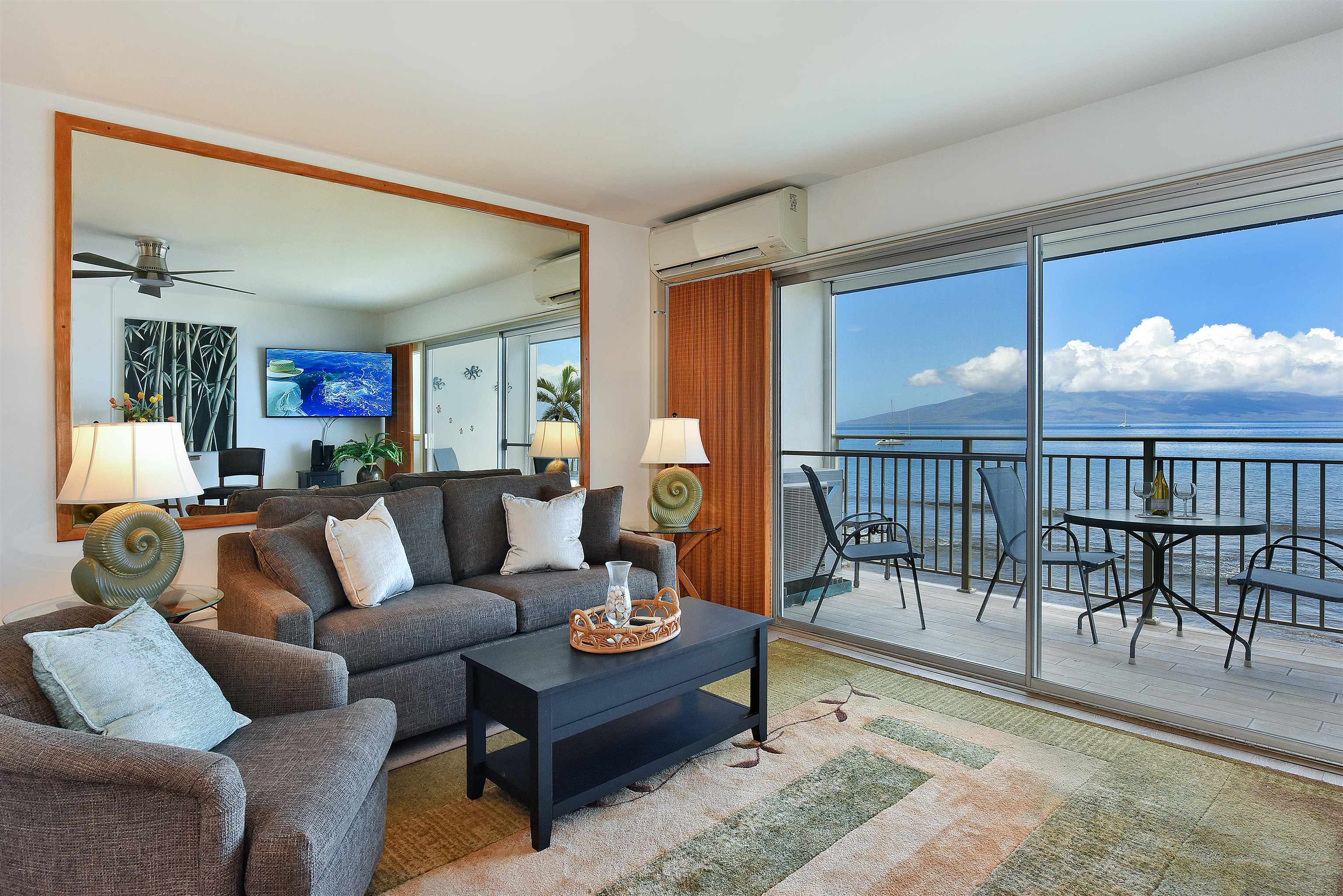 1403 Front Street, Unit 308 Lahaina, HI 96761 - Photo 9 of 35 a living room with furniture and a large window