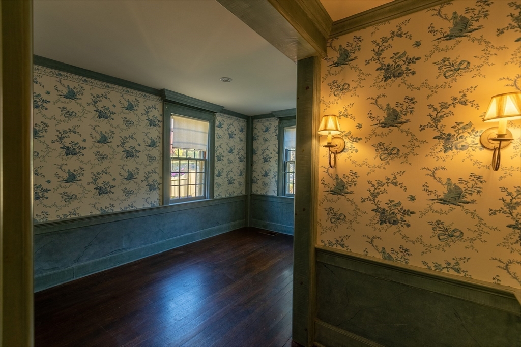 105 Church Street Ware, MA 01082 - Photo 13 of 41 a view of hallway with wooden floor and a door