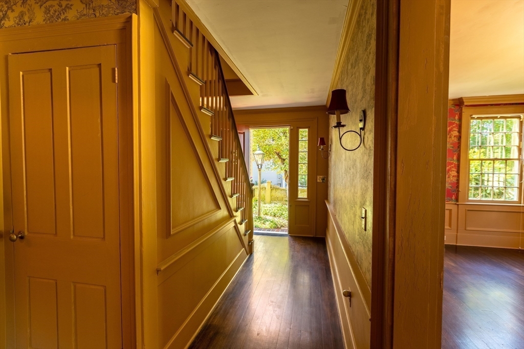 105 Church Street Ware, MA 01082 - Photo 18 of 41 a view of an entryway with wooden floor windows and a livingroom