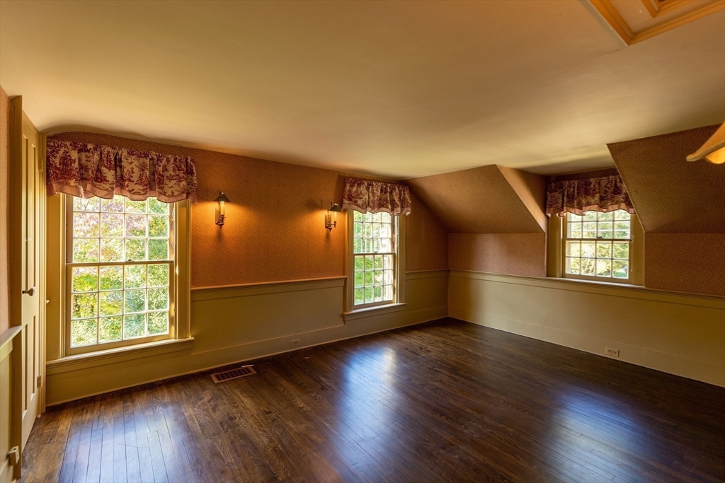 105 Church Street Ware, MA 01082 - Photo 20 of 41 a view of livingroom with hardwood floor and window