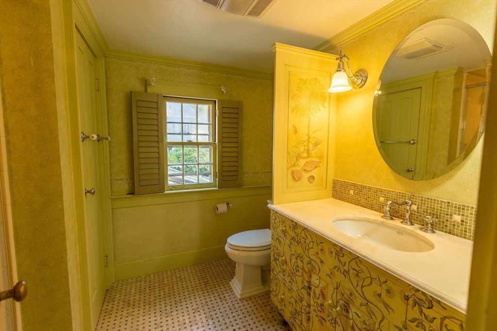 105 Church Street Ware, MA 01082 - Photo 24 of 41 a bathroom with a sink and a mirror