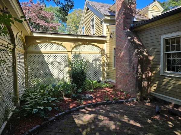 a bathroom with a sink toilet and mirror