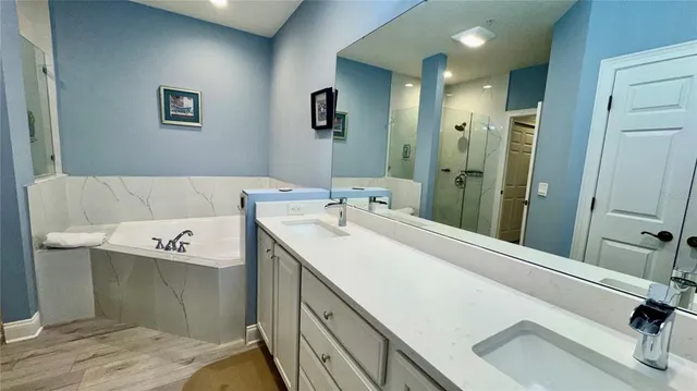 a utility room with a sink dryer and washer