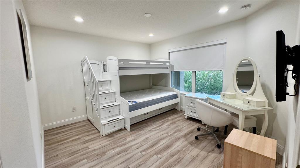 6826 Sorrento Street Orlando, FL 32819 - Photo 18 of 28 a view of a workspace with furniture and a window