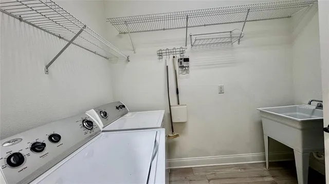 a utility room with dryer and washer