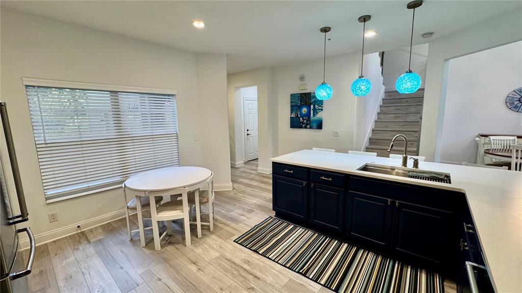 6826 Sorrento Street Orlando, FL 32819 - Photo 7 of 28 a spacious bathroom with a sink a toilet a mirror and shower