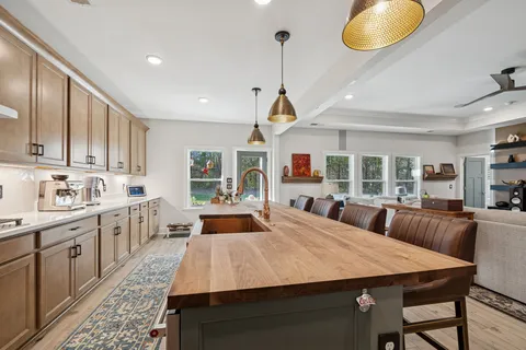 a view of room with window and wooden floor