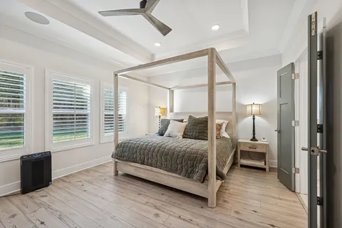 a front view of a house with swimming pool having outdoor seating