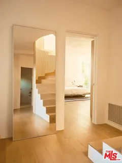 a bathroom with a tub and shower