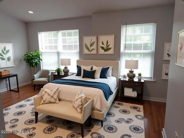 a bedroom with a bed and a couch