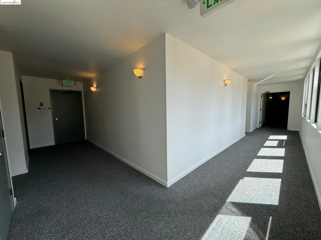 a view of a hallway with closet