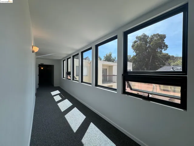 a view of a building with a street