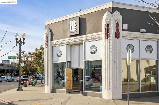 a front view of building with yard