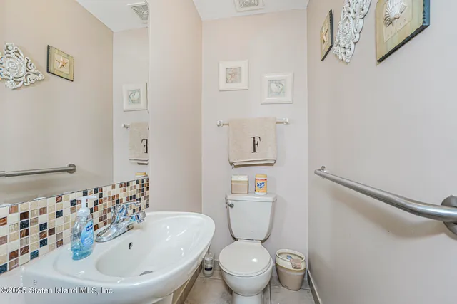 a bathroom with a sink and a toilet