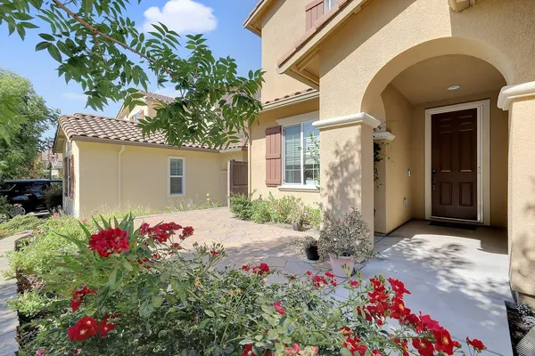 a front view of a house having yard