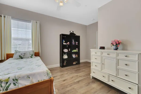 a view of a patio with a table and chairs