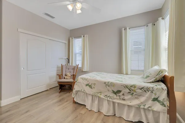 a view of a backyard with sitting area and furniture