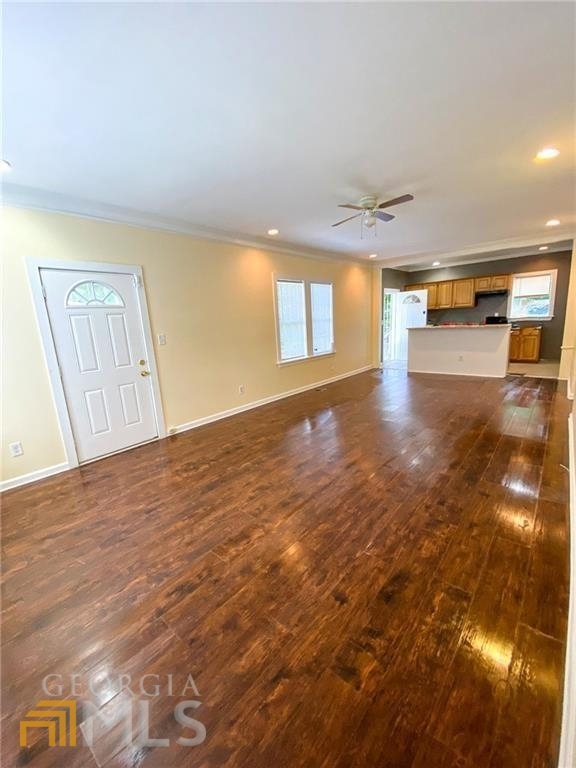 251 Holly Road Northwest Atlanta, GA 30314 - Photo 2 of 21 a view of empty room with wooden floor