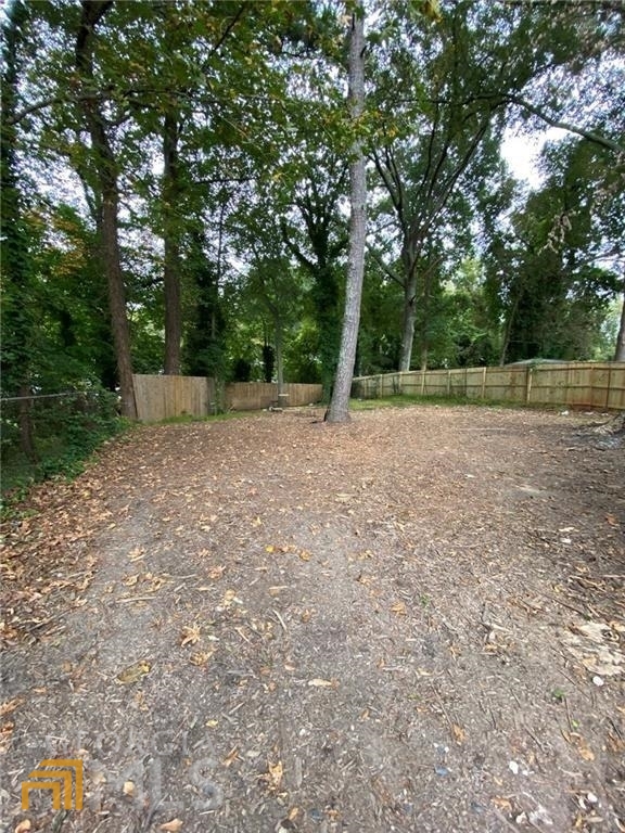 251 Holly Road Northwest Atlanta, GA 30314 - Photo 21 of 21 a view of a yard with a tree