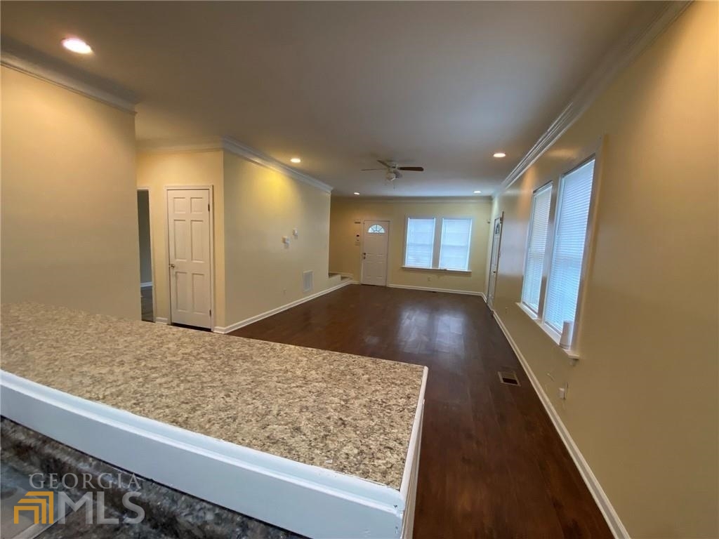 251 Holly Road Northwest Atlanta, GA 30314 - Photo 5 of 21 a view of kitchen and wooden floor