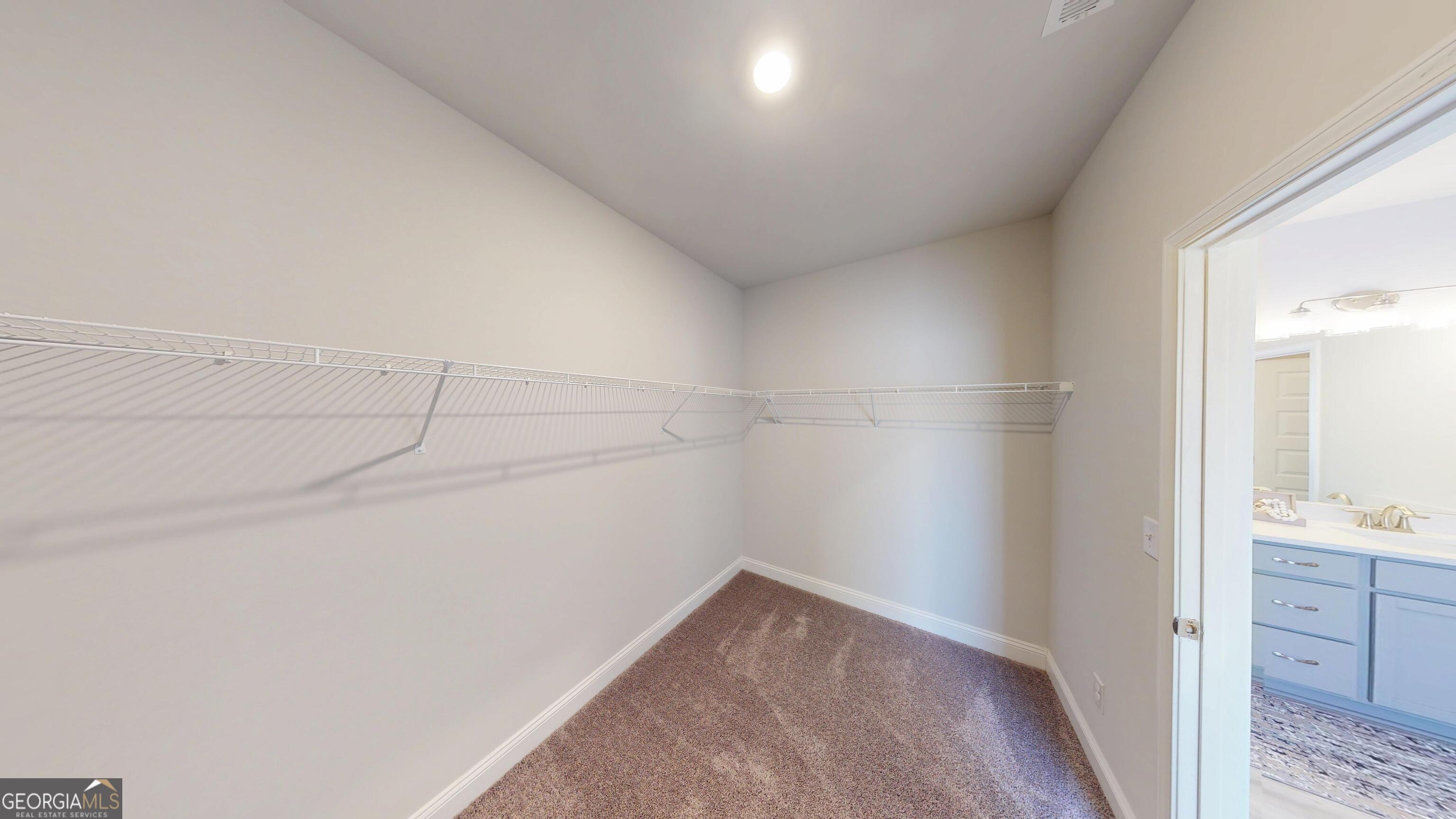 1007 Holiday Pass Griffin, GA 30223 - Photo 14 of 22 a view of a storage & utility room with closet