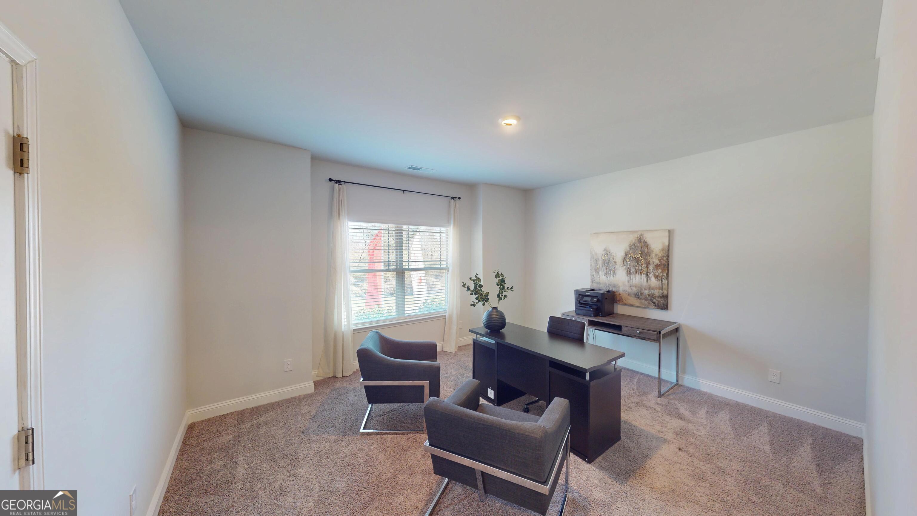 1007 Holiday Pass Griffin, GA 30223 - Photo 16 of 22 a workspace with furniture and window