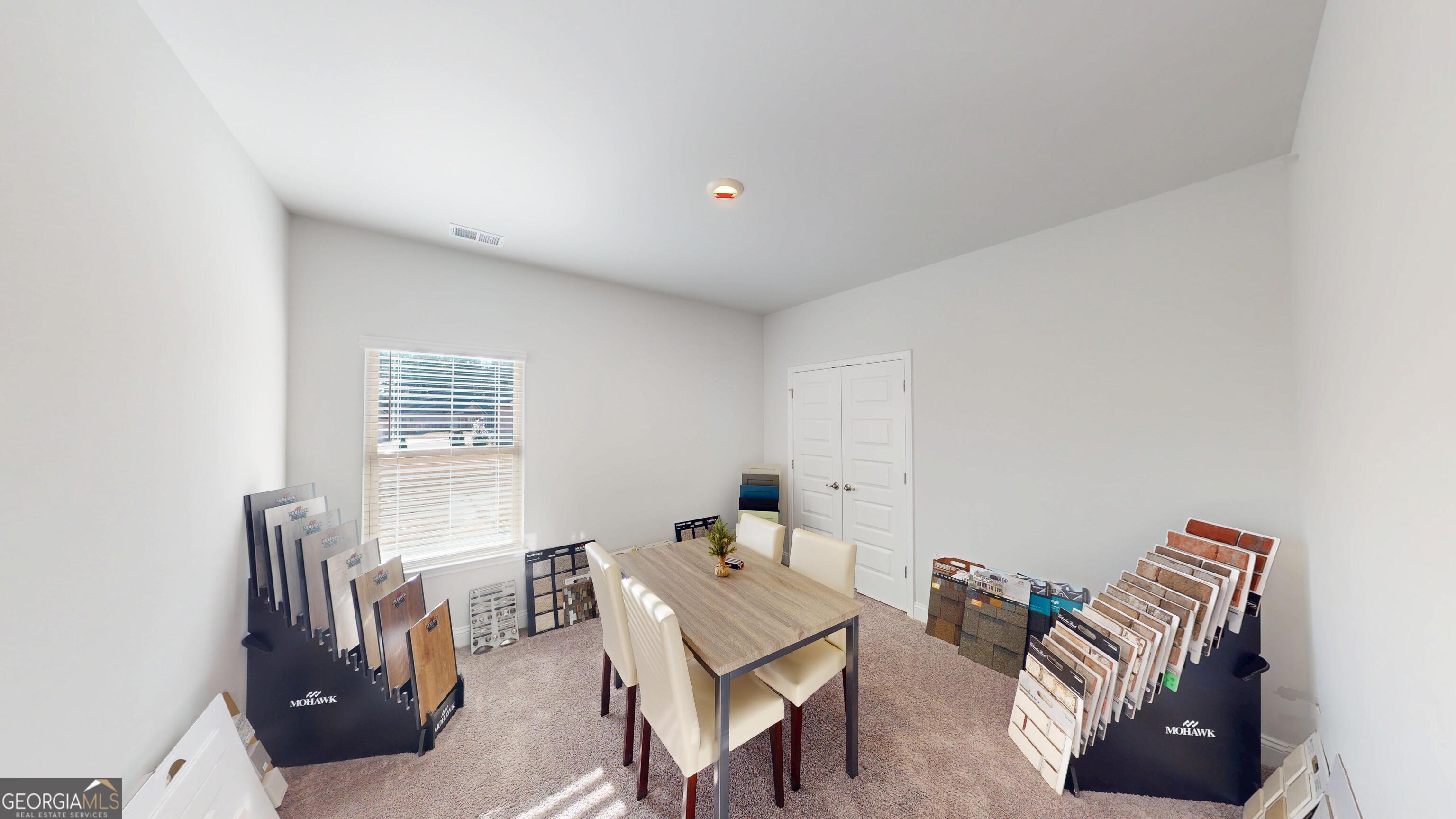 1007 Holiday Pass Griffin, GA 30223 - Photo 17 of 22 a living room with furniture and a window