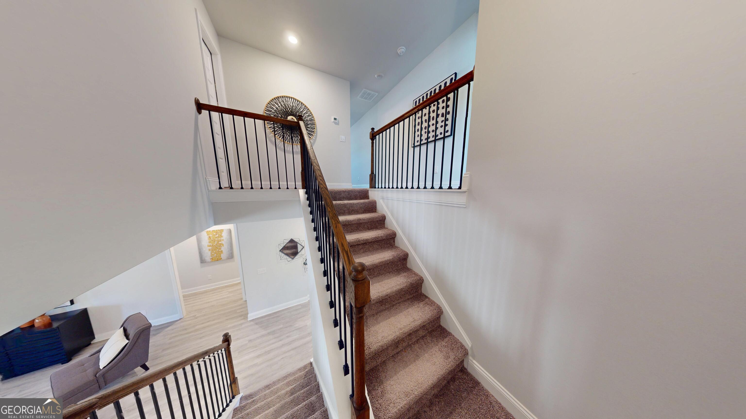1007 Holiday Pass Griffin, GA 30223 - Photo 19 of 22 a view of entryway and hall with wooden floor