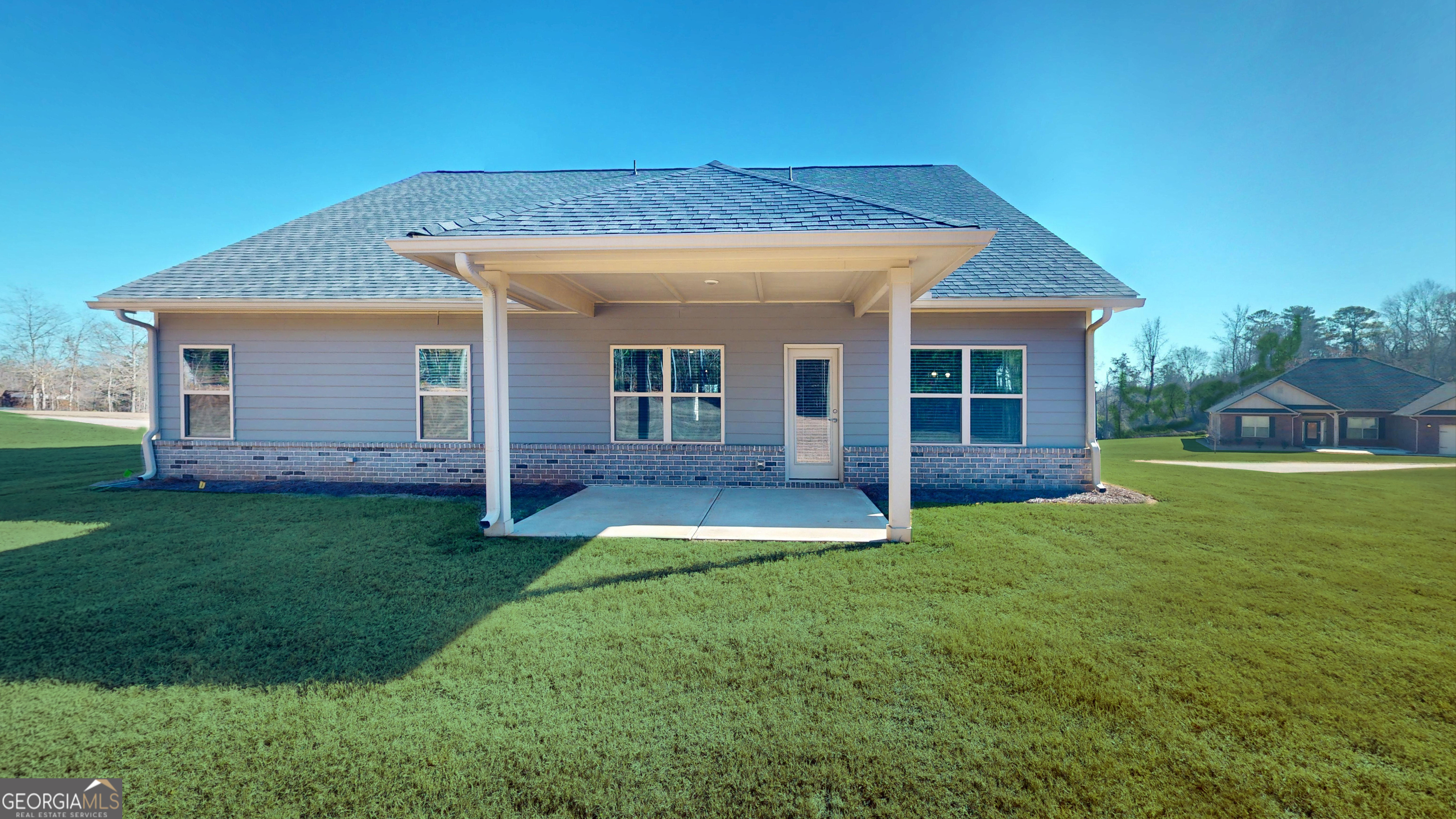 1007 Holiday Pass Griffin, GA 30223 - Photo 2 of 22 a view of a house with a yard