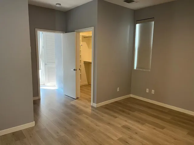 a bathroom with a shower and toilet