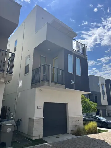 a car parked in front of a house
