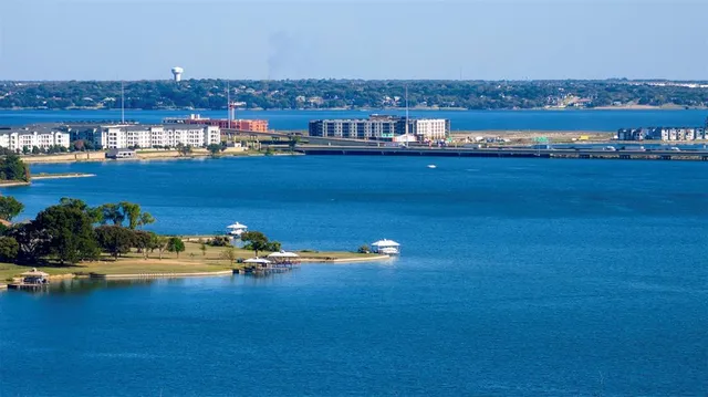 an ocean view with residential houses with outdoor space