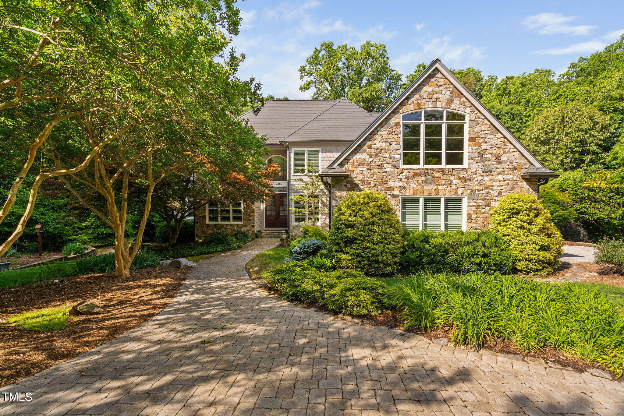 10405 Veasey Mill Road Raleigh, NC 27615 - Photo 1 of 94 a front view of a house with a yard