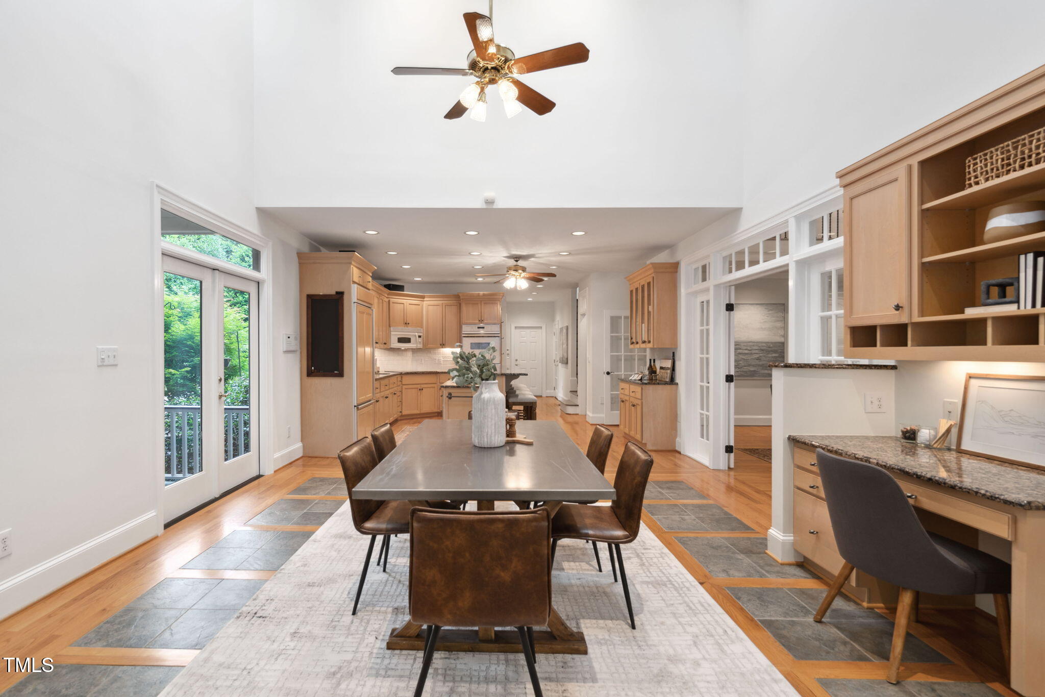 10405 Veasey Mill Road Raleigh, NC 27615 - Photo 16 of 94 a view of a dining room with furniture window and outside view