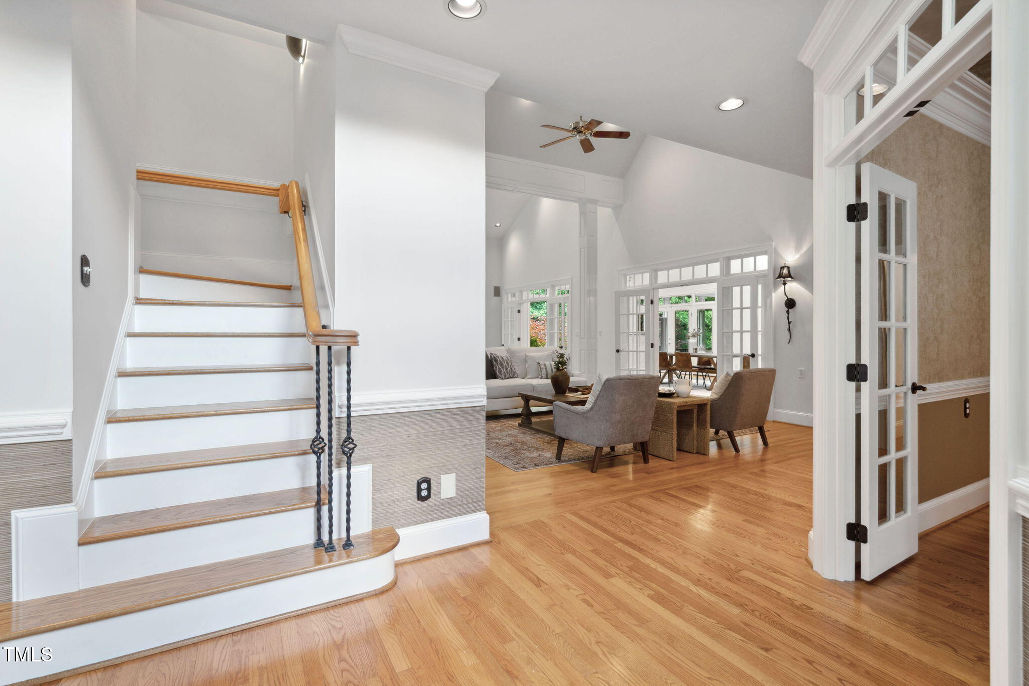 10405 Veasey Mill Road Raleigh, NC 27615 - Photo 24 of 94 a living room with furniture and wooden floor