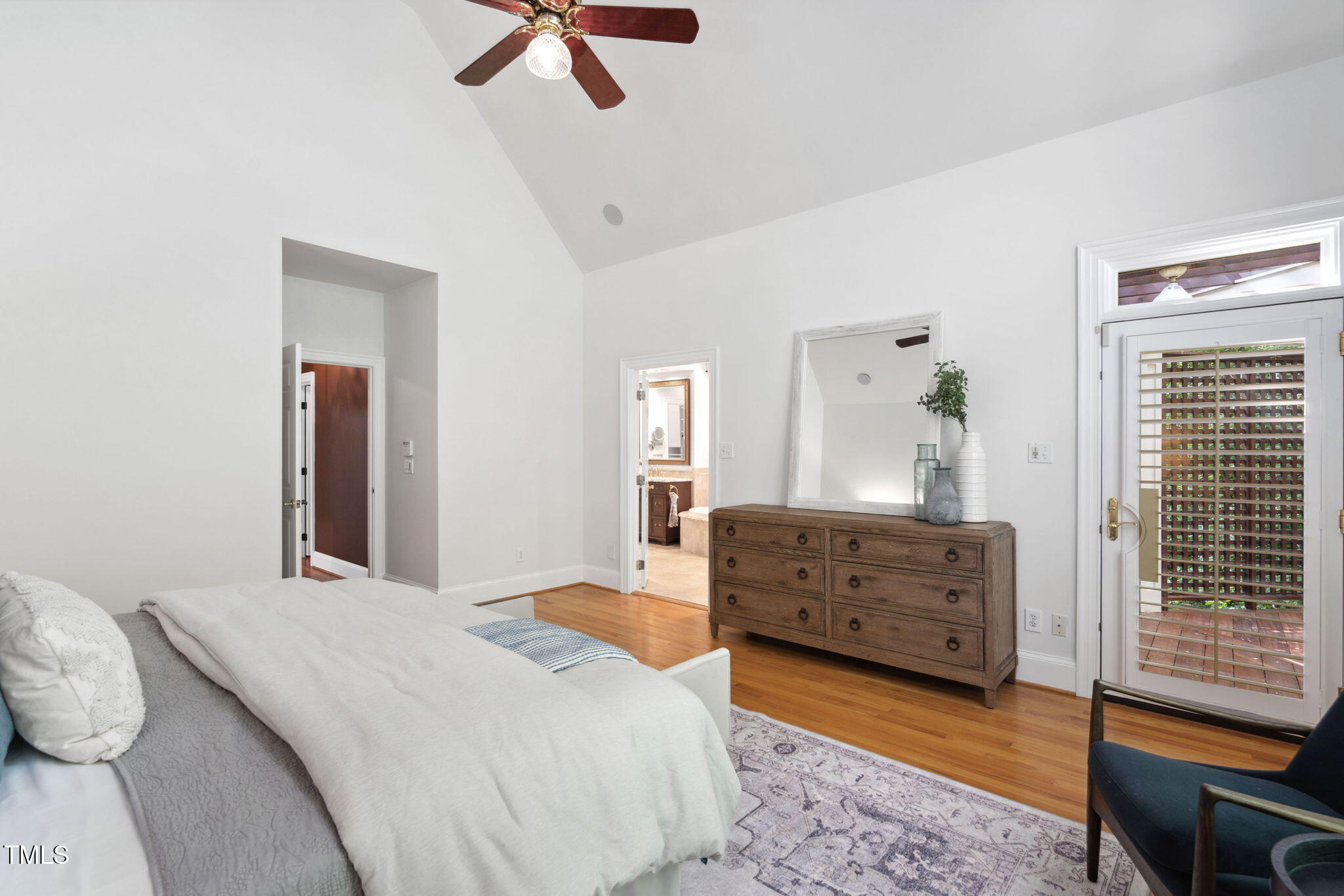 10405 Veasey Mill Road Raleigh, NC 27615 - Photo 28 of 94 a bedroom with a bed and a dresser