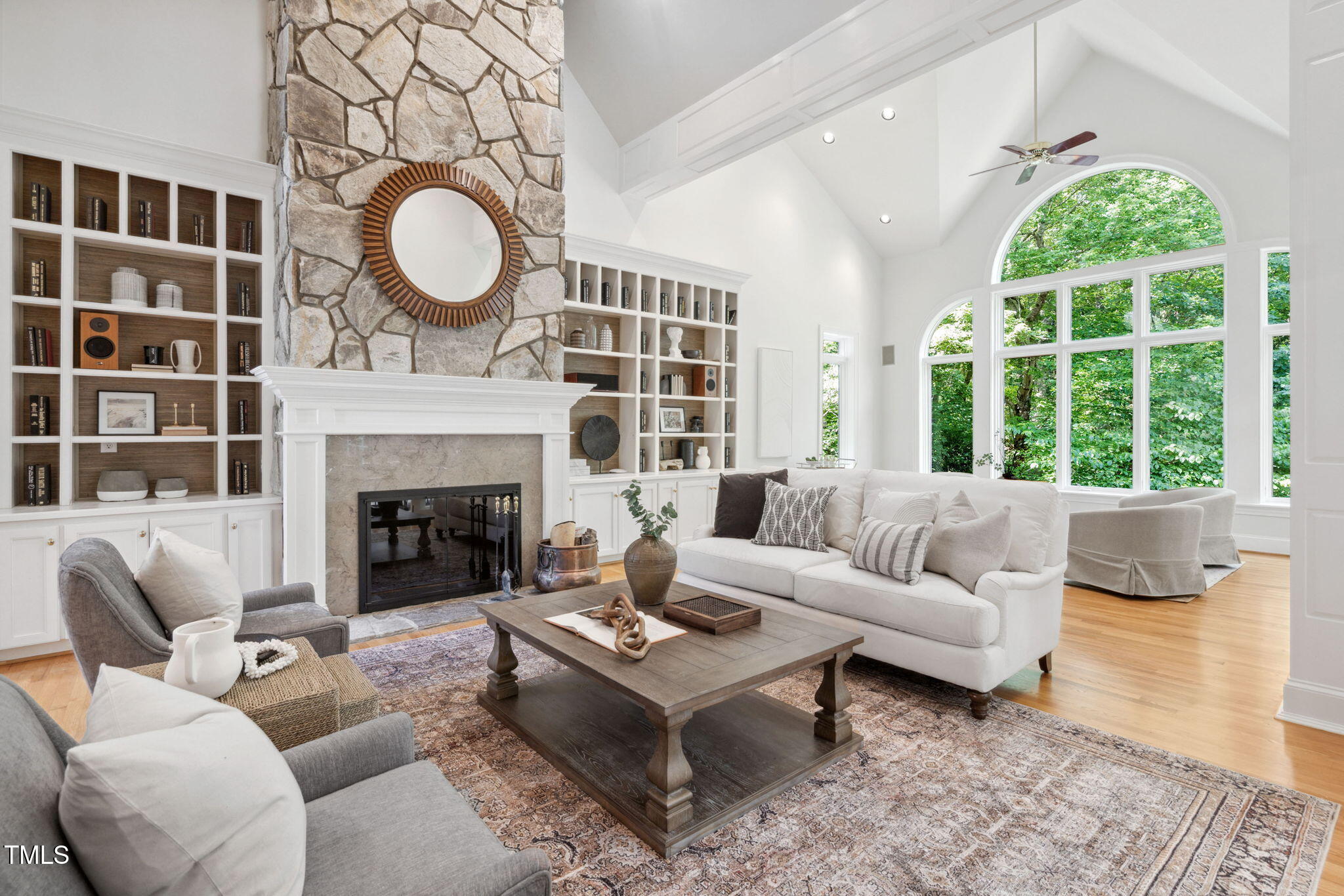 10405 Veasey Mill Road Raleigh, NC 27615 - Photo 3 of 94 a living room with furniture a fireplace and window