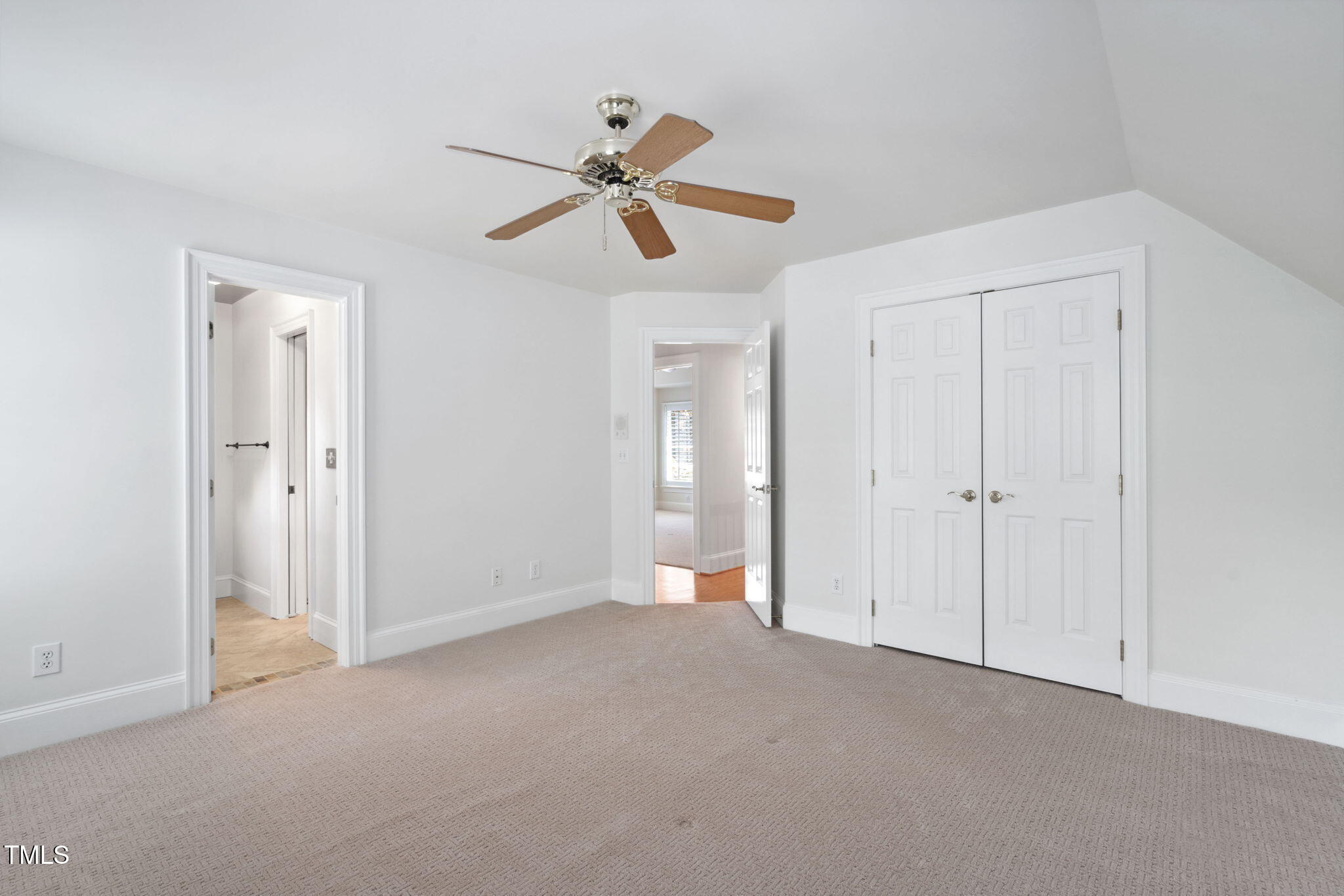 10405 Veasey Mill Road Raleigh, NC 27615 - Photo 36 of 94 a view of an empty room and chandelier fan