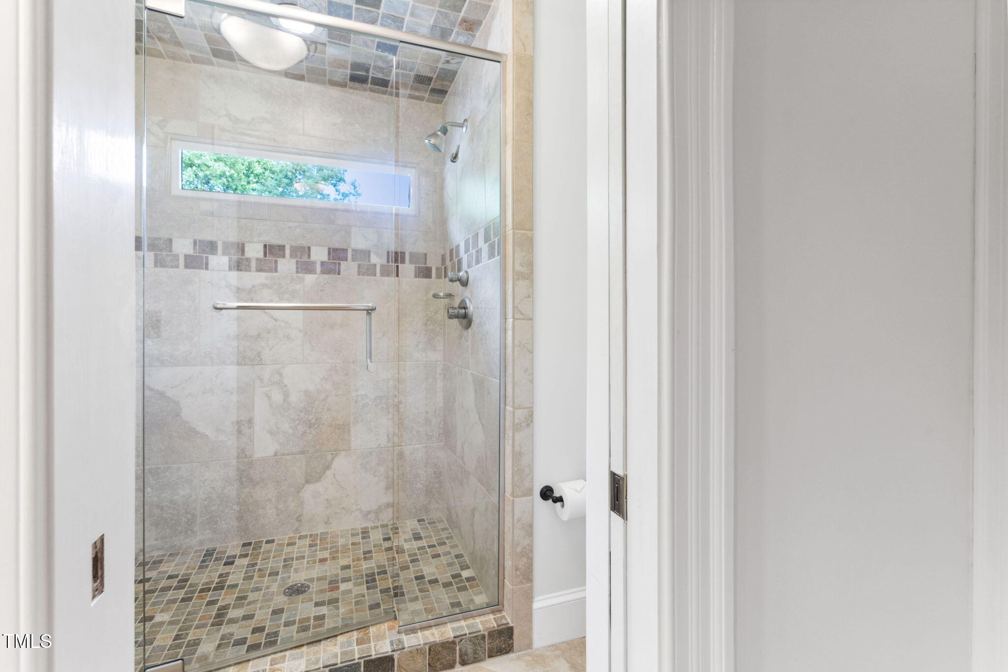 10405 Veasey Mill Road Raleigh, NC 27615 - Photo 40 of 94 a bathroom with a shower