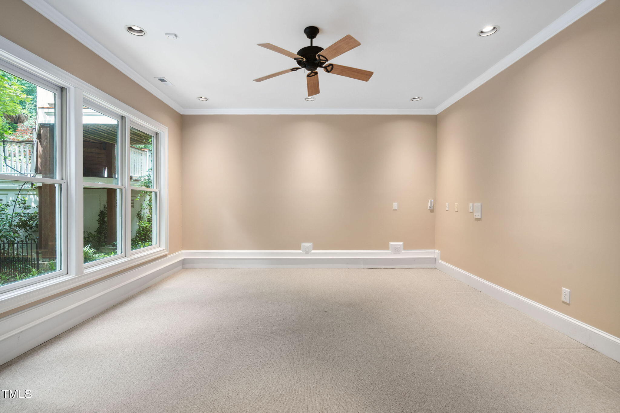 10405 Veasey Mill Road Raleigh, NC 27615 - Photo 44 of 94 a view of an empty room with a window