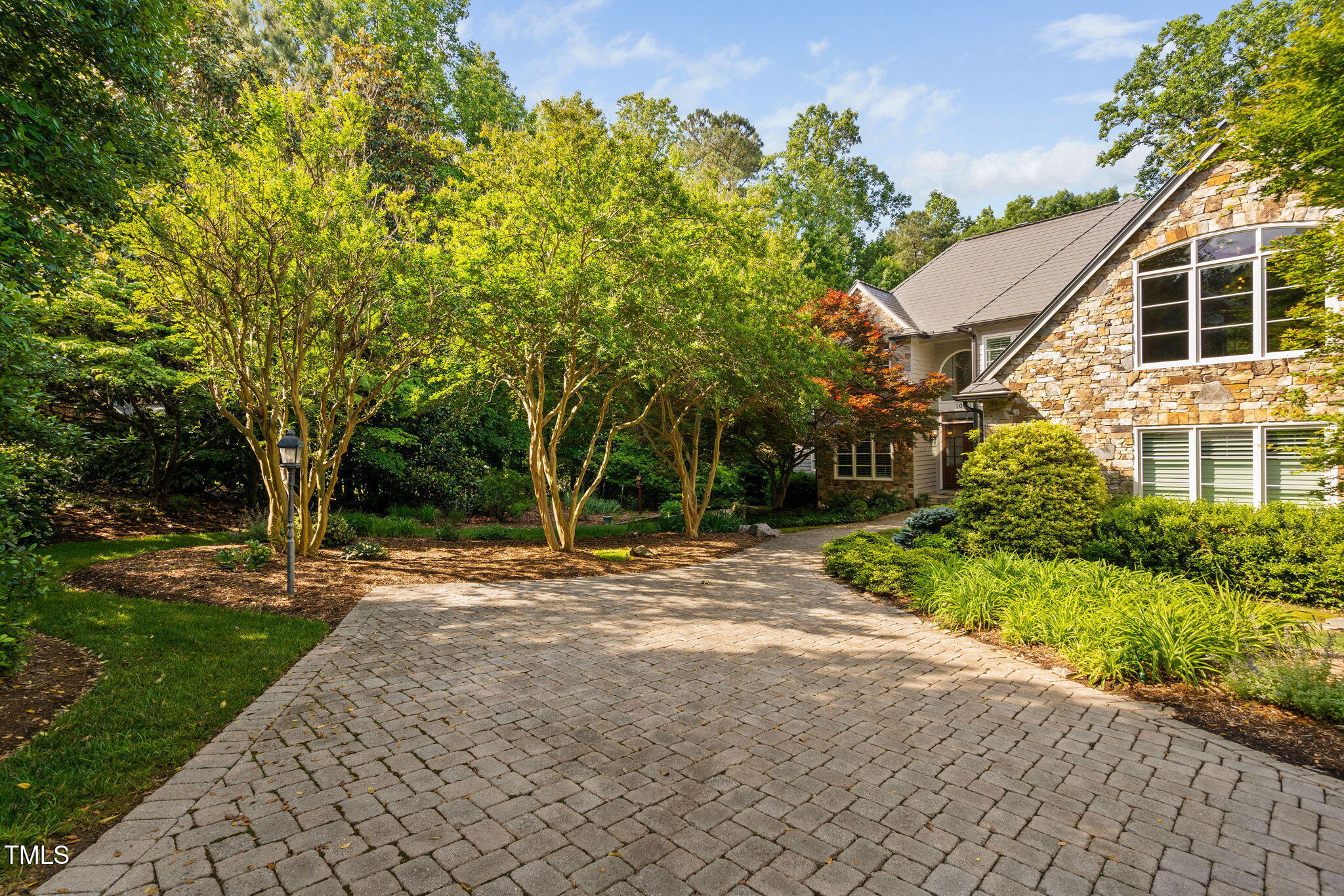 10405 Veasey Mill Road Raleigh, NC 27615 - Photo 89 of 94 a view of a house with backyard and a tree