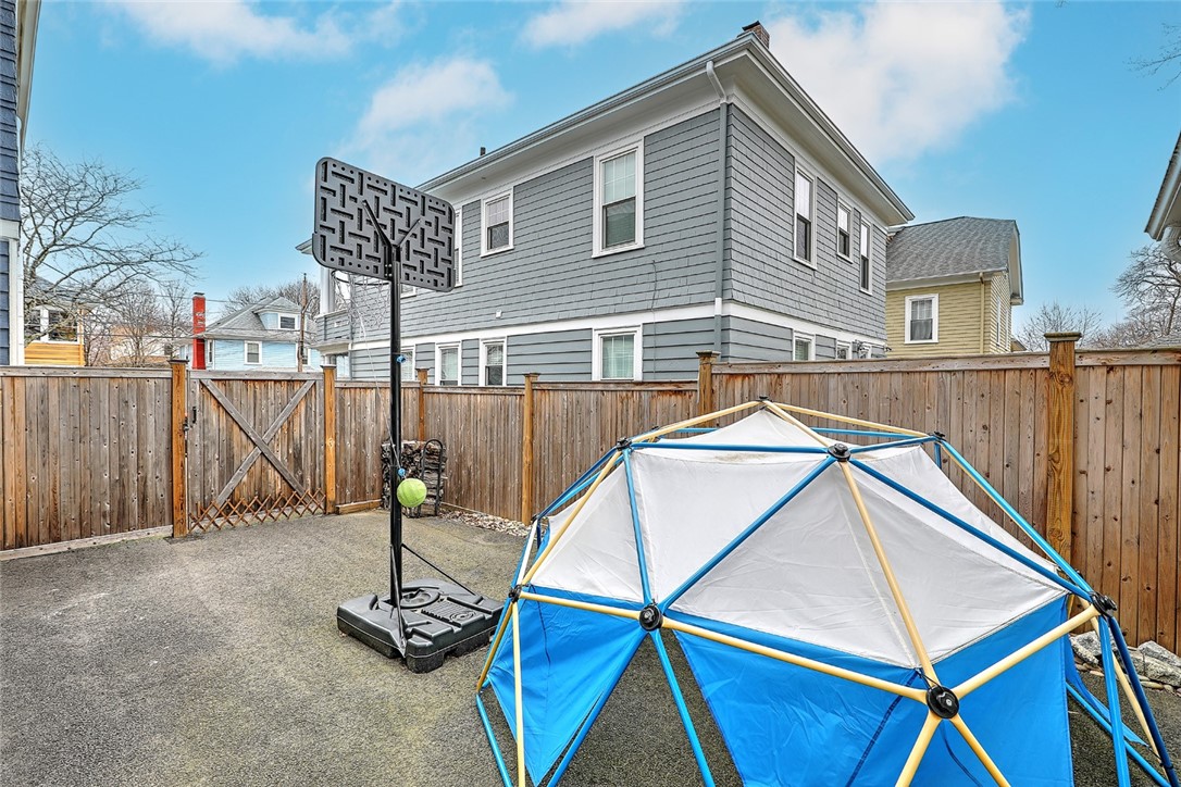 67 Overhill Road Providence, RI 02906 - Photo 49 of 49 Fenced drieveway in front of 2 car garage