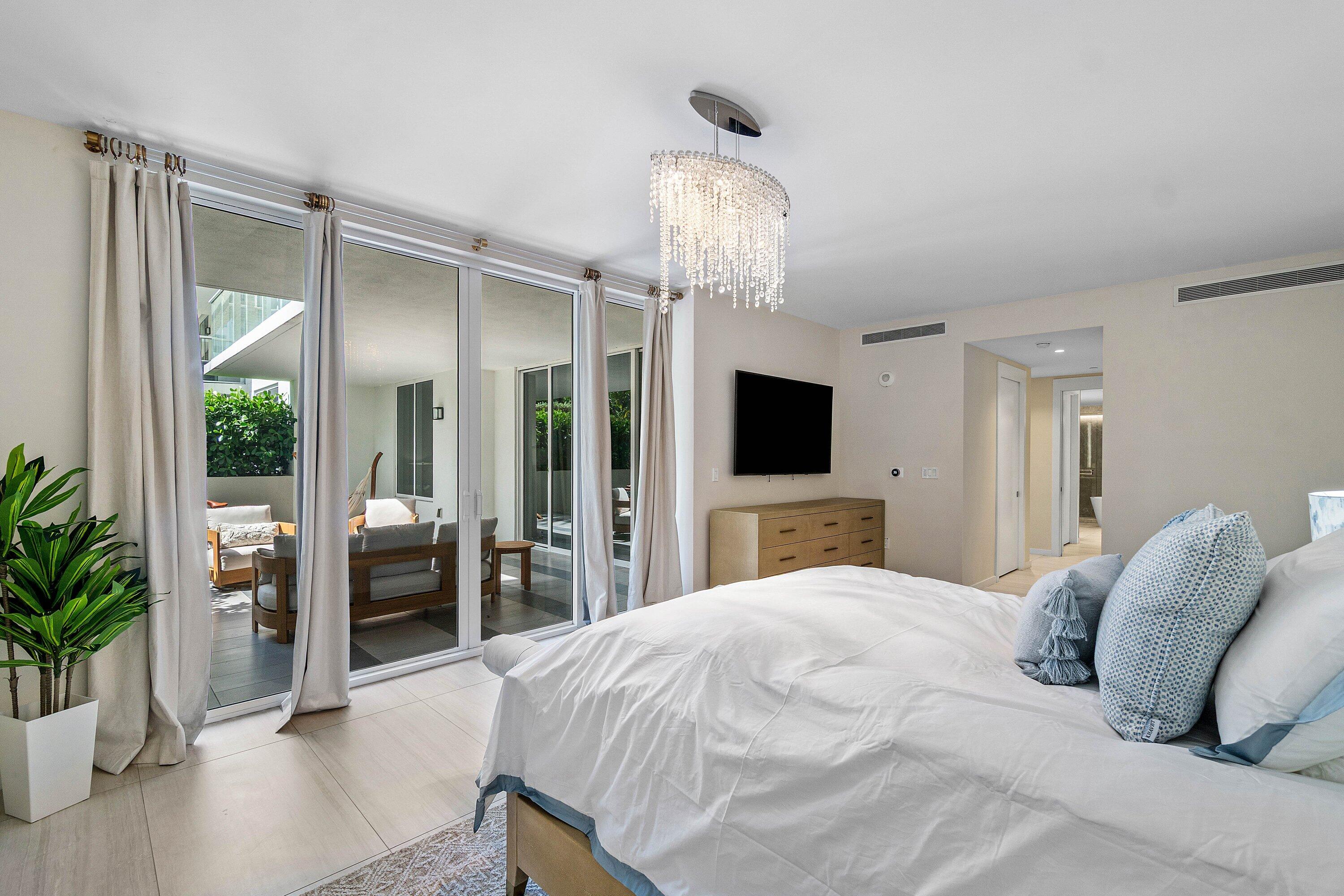 200 Southeast Mizner Boulevard, Unit 209 Boca Raton, FL 33432 - Photo 13 of 59 Primary Bedroom