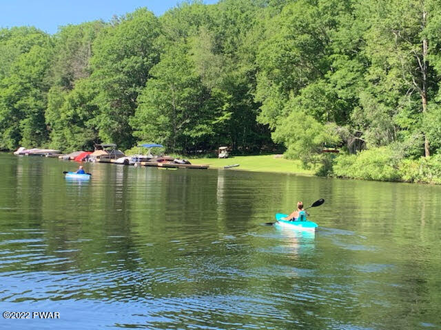 549 Finn Swamp Road Lakeville, PA 18438 - Photo 25 of 35 a view of a lake with a big yard
