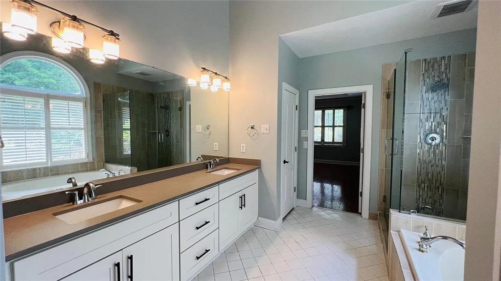 8569 Spring Breeze Terrace Suwanee, GA 30024 - Photo 23 of 39