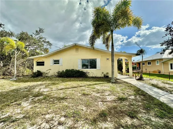 a view of a house with a patio