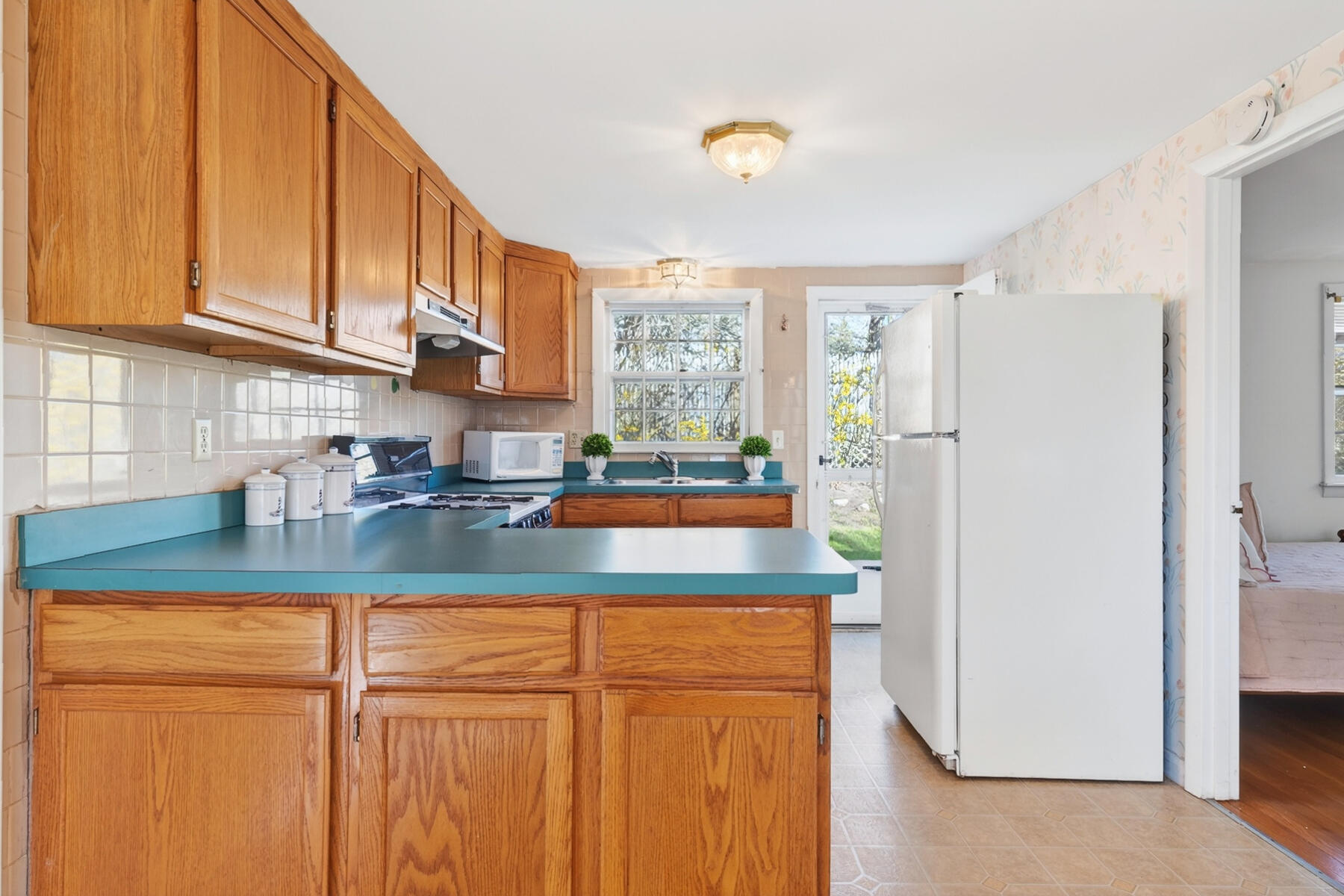 268 Trotting Park Road West Dennis, MA 02670 - Photo 10 of 35 Kitchen to Back yard