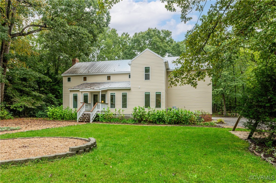 13321 Hensley Road Chesterfield, VA 23832 - Photo 1 of 48 a view of house with yard and green space