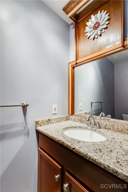 13321 Hensley Road Chesterfield, VA 23832 - Photo 20 of 48 a bathroom with a granite countertop sink and a mirror