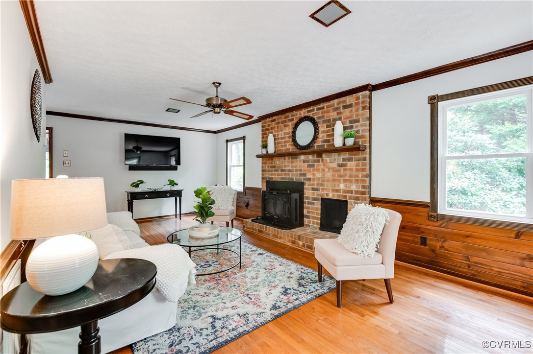 13321 Hensley Road Chesterfield, VA 23832 - Photo 3 of 48 a living room with furniture and a fireplace